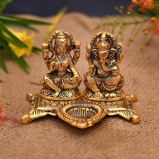 Laxmi Ganesh Statue with diya