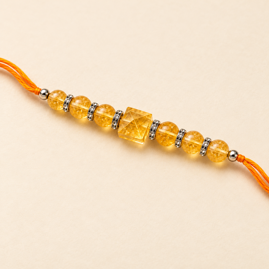Citrine Pyramid Rakhi – Crystal-Inspired Raksha Bandhan Gift — product detail