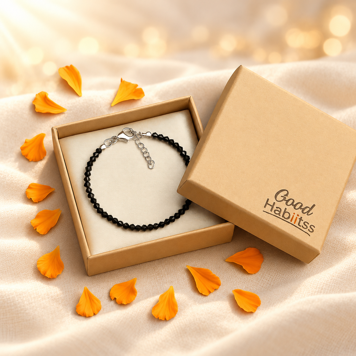 Black Tourmaline Anklet – Natural Gemstone Jewellery on warm cream background