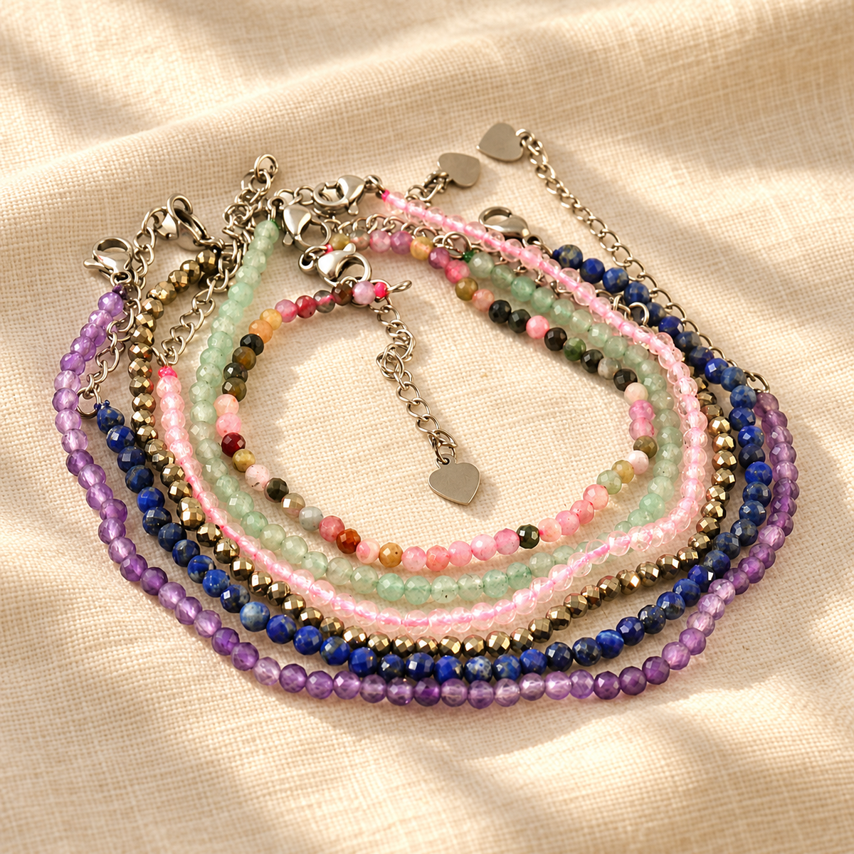 Set of 6 Natural Stone Bracelets – 3mm Faceted Beads on warm cream linen