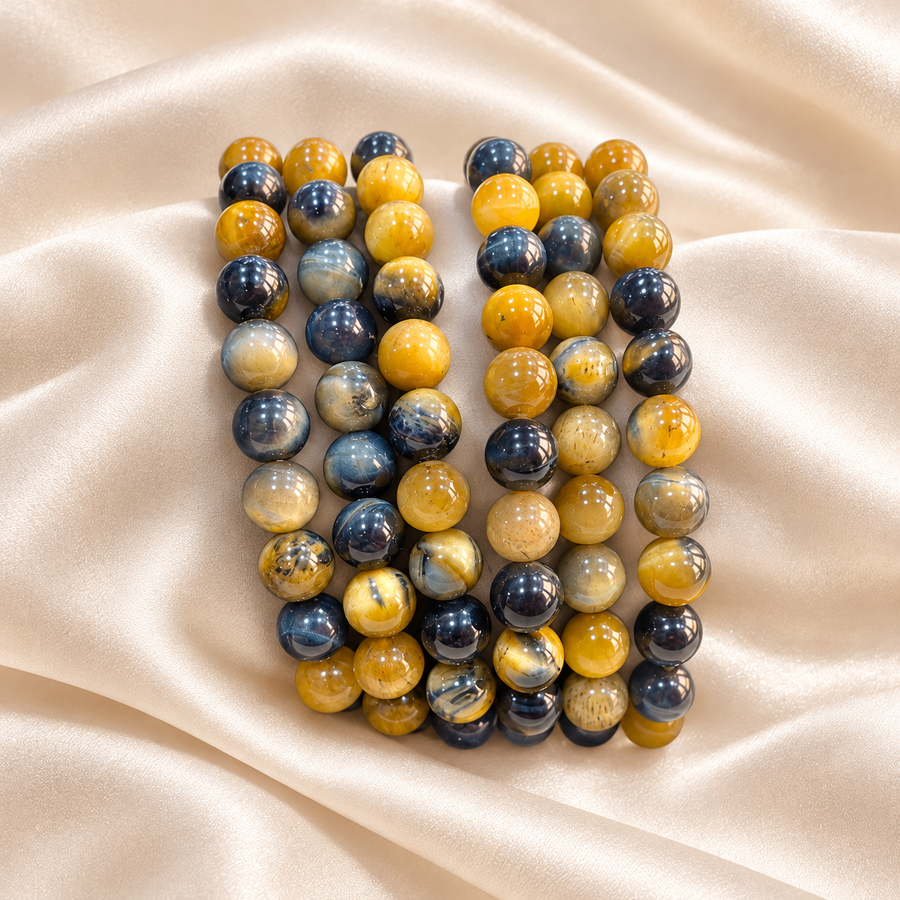 Golden Blue Tiger Eye Bracelet – 8mm Natural Gemstone Jewellery on champagne fabric