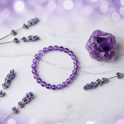 Natural Amethyst Bracelet on white marble with amethyst cluster and lavender