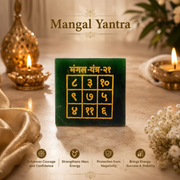 Mangal Yantra on marble surface with brass diya