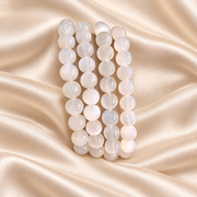 Natural White Moonstone Bracelet – 8mm Gemstone Jewellery on champagne fabric
