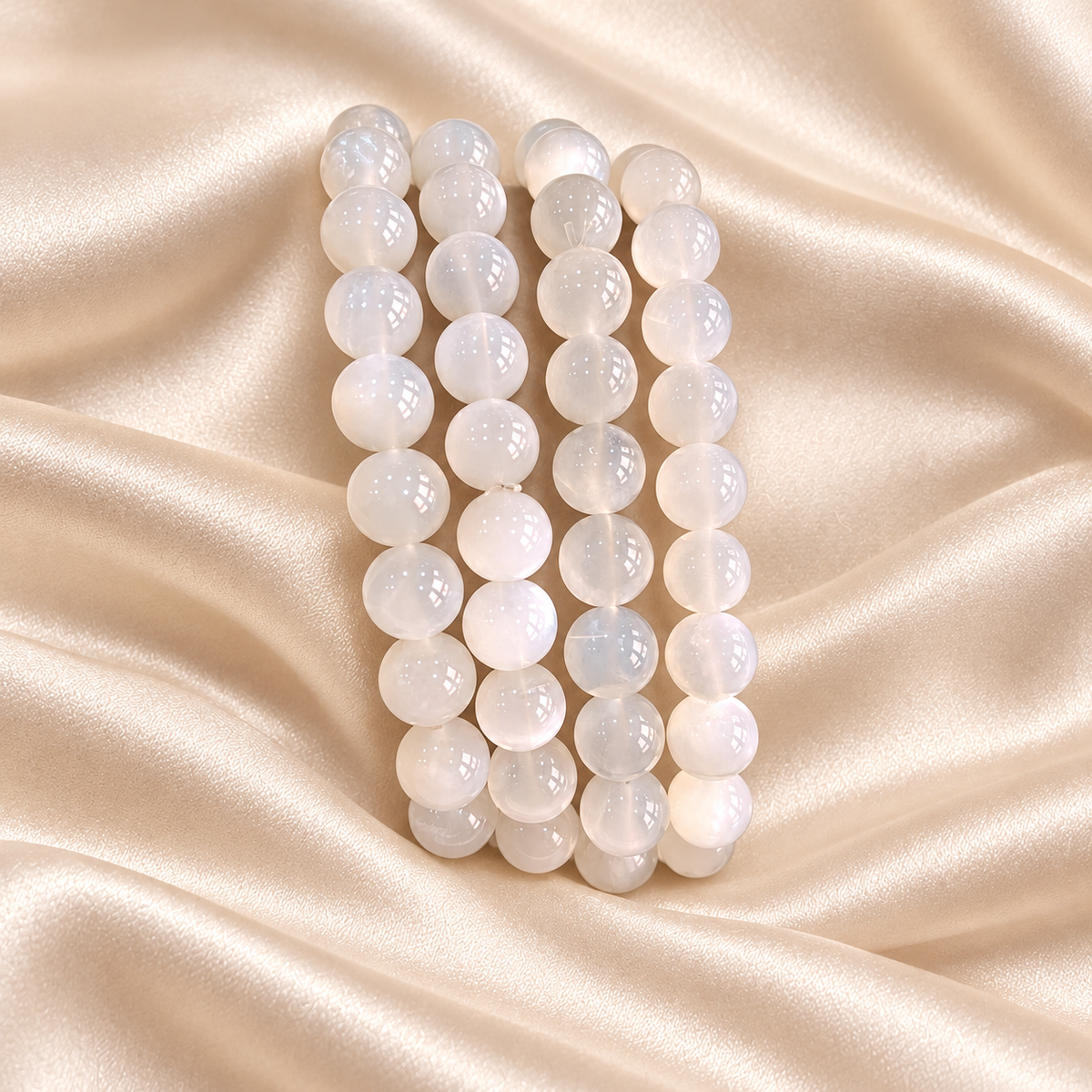 Natural White Moonstone Bracelet – 8mm Gemstone Jewellery on champagne fabric