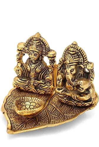 Laxmi Ganesh Statue with diya